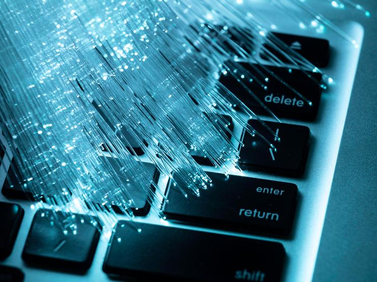 blue-optic-fiber-with-laptop.jpeg