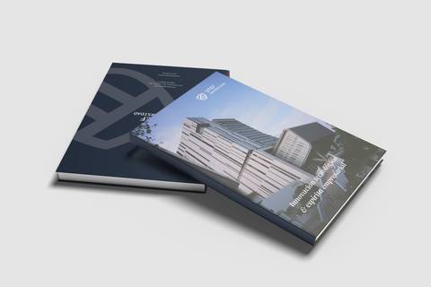 Two brochures with a modern design, one featuring a cityscape on the cover.