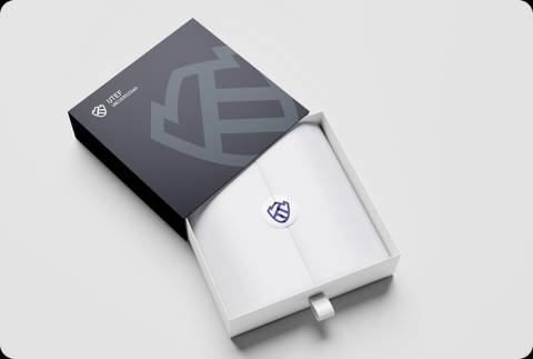 An open product box displaying a white device with a blue logo inside.